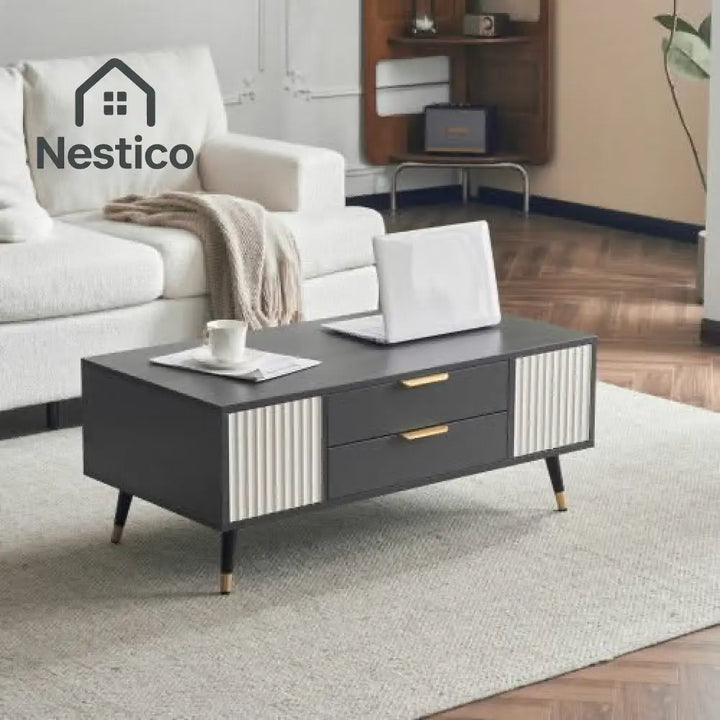 Modern gray and white coffee table with drawers and gold accents