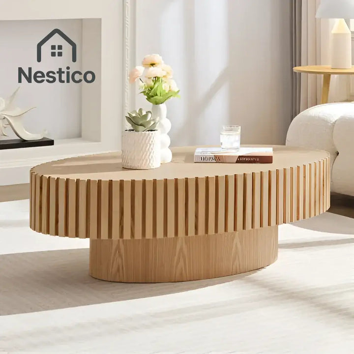 Oval wooden coffee table in natural ash finish from Modern Handmade Drum Coffee collection