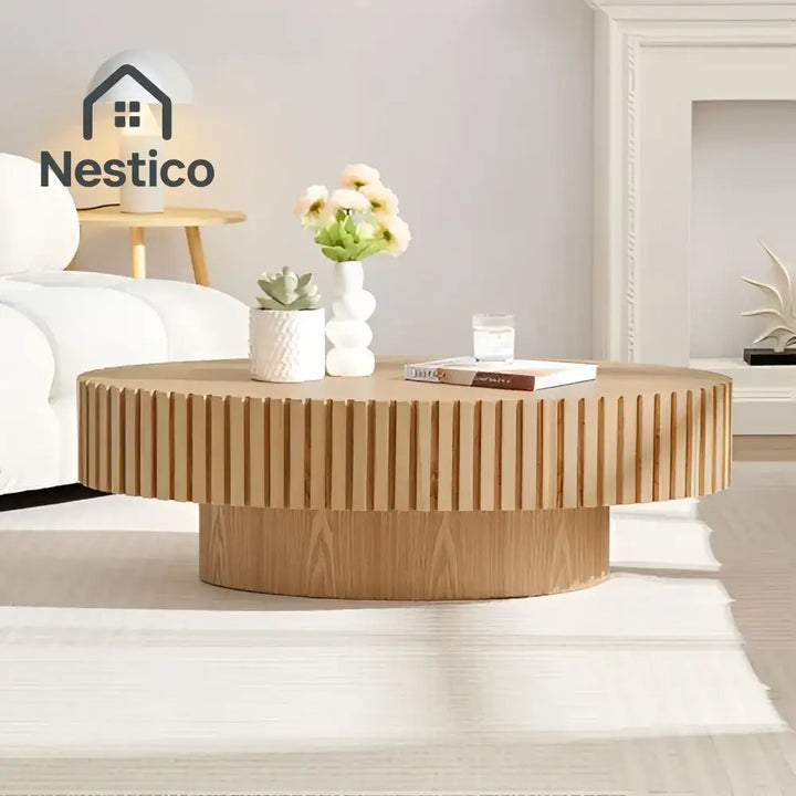 Round light-wood modern handmade drum coffee table in natural ash finish